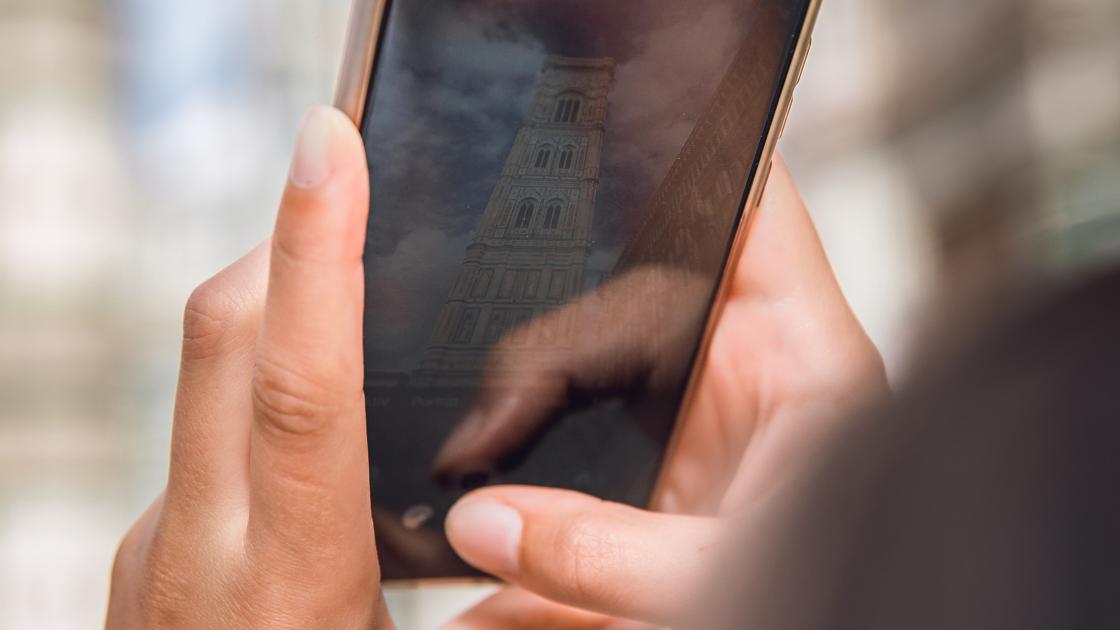 hands holding phone