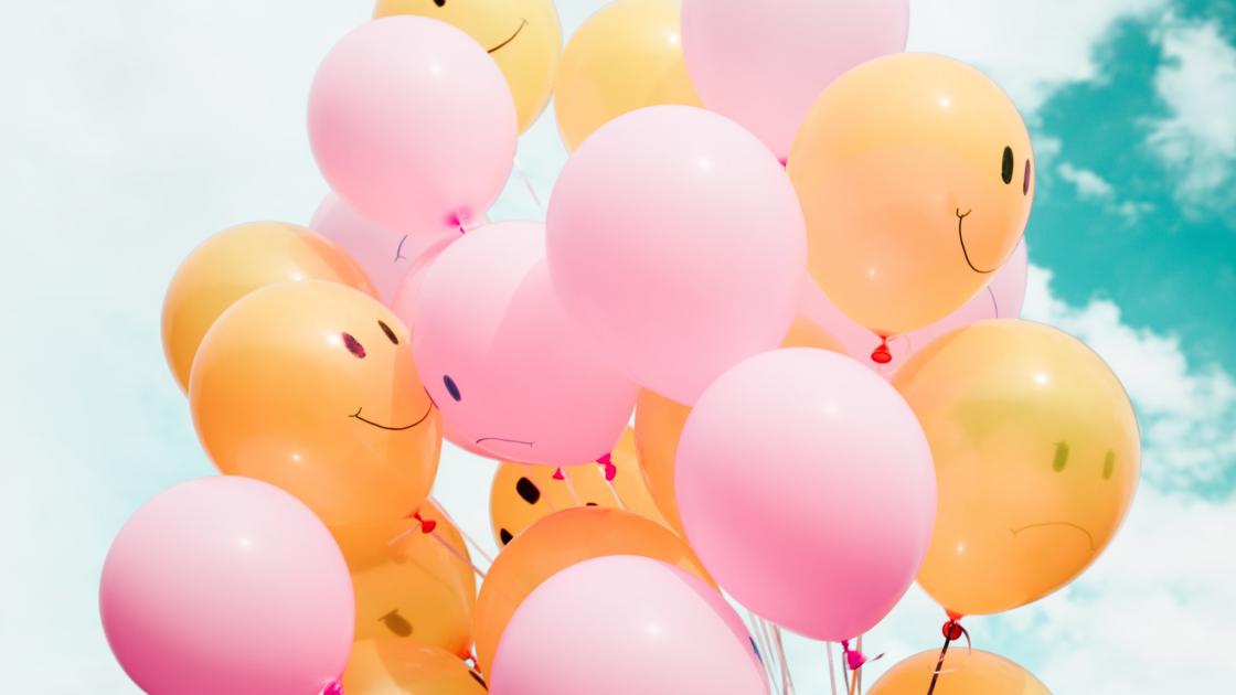 happy face balloons and sad face balloons