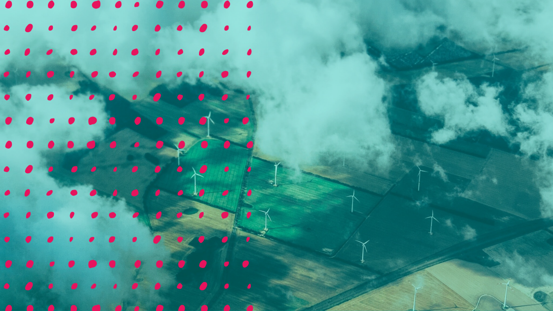 view of clouds and wind turbines