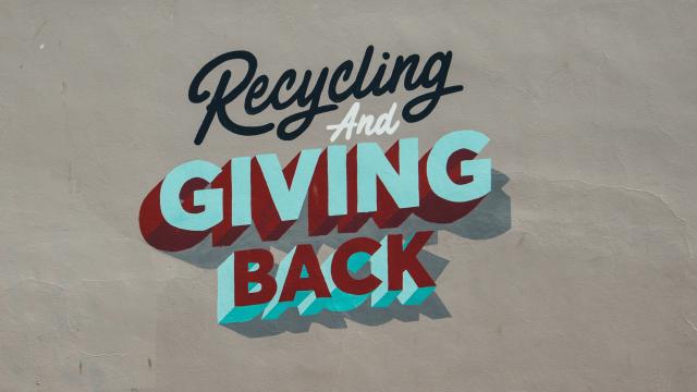 grafitti saying recycle and giving back