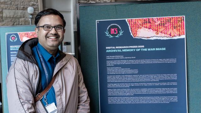 Attendee with poster at CDCS DRP 2026
